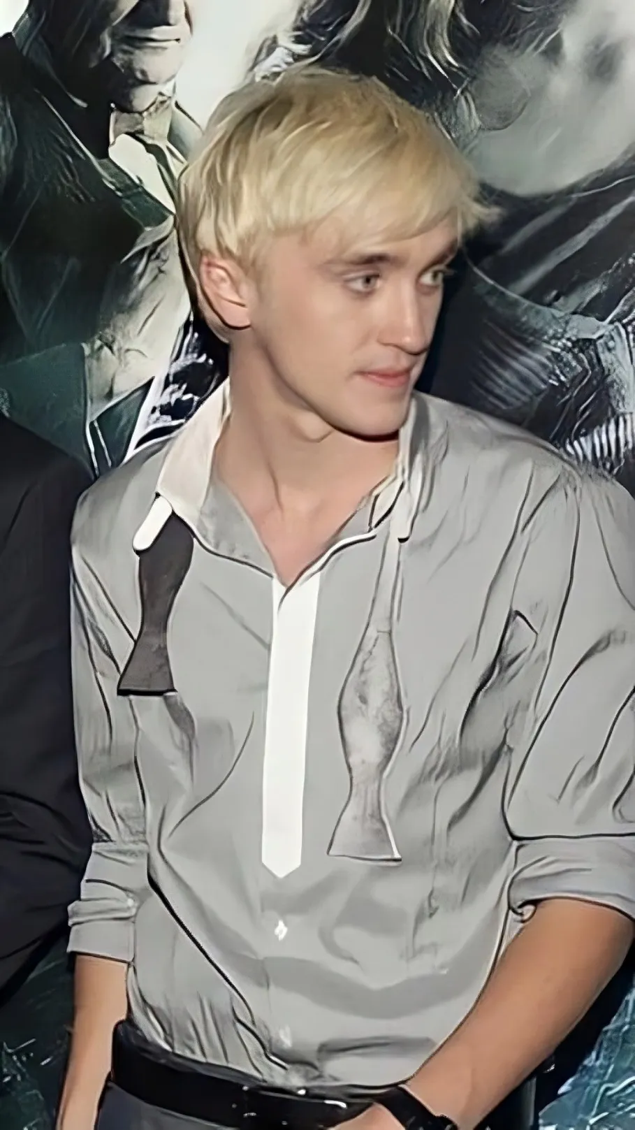 ai character: Tom Felton background