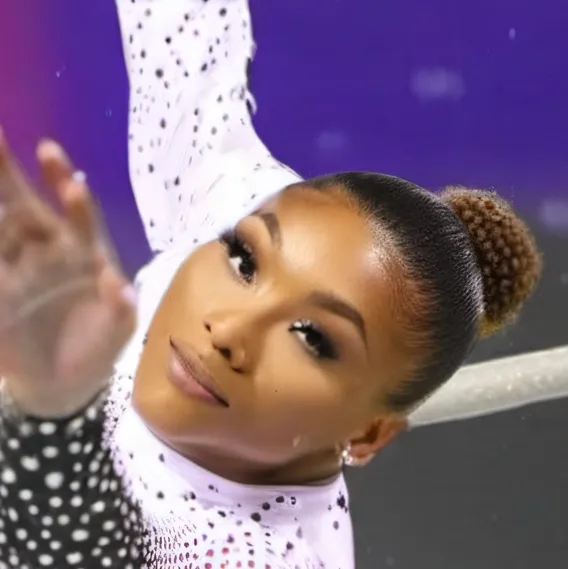 chat with ai character: Jordan Chiles