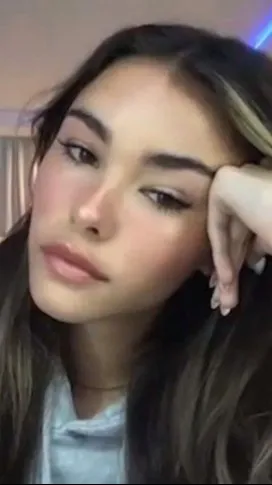 ai character: Madison Beer background