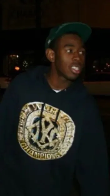 ai character: Tyler, The Creator background