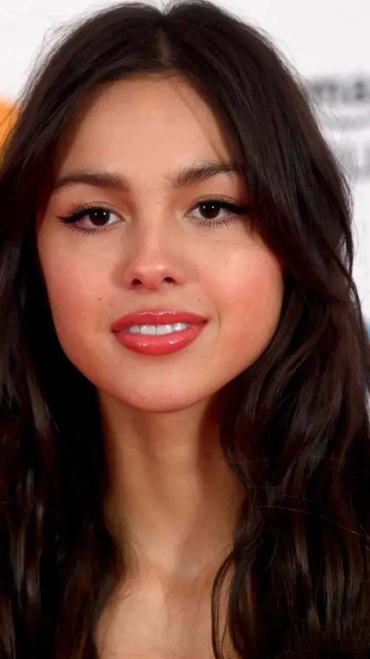 ai character: Olivia Rodrigo background