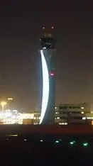 ai character: HAMAD AIRPORT ATC background