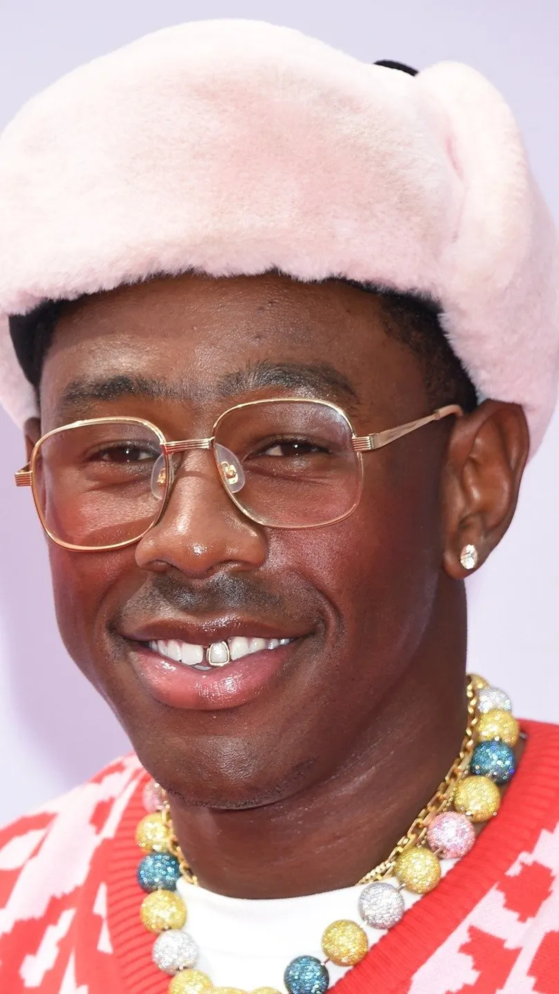 ai character: Tyler, The Creator background