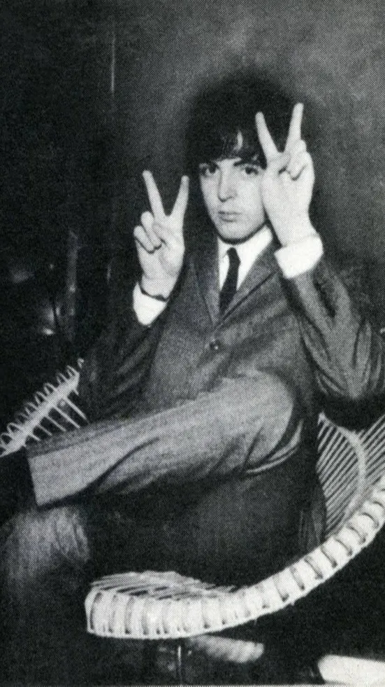 ai character: Paul McCartney background