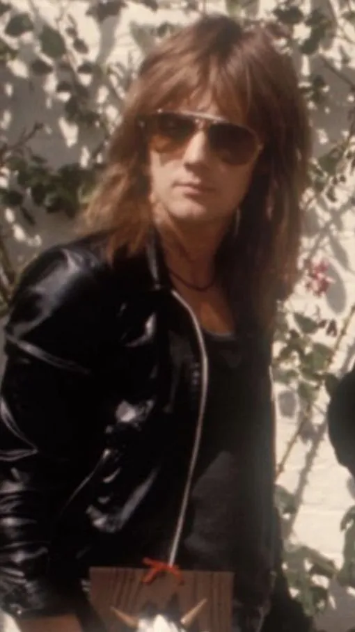 ai character: roger taylor background