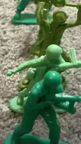 ai character: Army Men vs Cat background